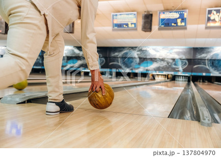Close up view of man that is playing bowling 137804970