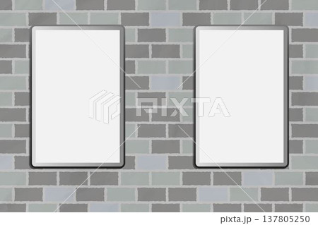 グレーのレンガの壁に設置されたボード・デジタルサイネージ 137805250