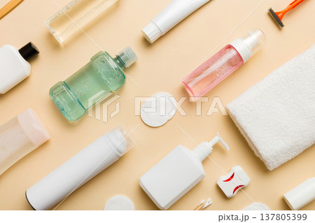 Mockup for bathing products top view flat lay, spa razor, toothpaste, soap, gel and other various accessories. Cosmetics for skin health. Bath Mockup for your logo 137805399