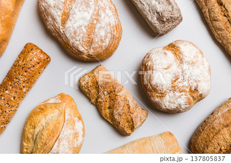 Homemade natural breads. Different kinds of fresh bread as background, top view with copy space 137805837