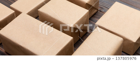 a lot of cardboard box on dark wooden background. top view 137805976