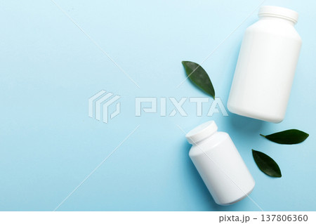 supplement pills with medicine bottle health care and medical top view. Vitamin tablets. Top view mockup bottle for pills and vitamins with green leaves, natural organic bio supplement, copy space supplement pills with medicine bottle health care and medical top view. Vitamin tablets. Top view mockup bottle for pills and vitamins with green leaves, natural organic bio supplement, copy space 137806360