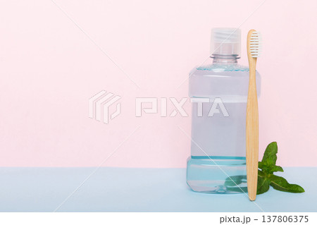Mouthwash and fresh mint on colored background, top view with copy space for text 137806375