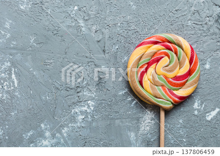 Set of colorful lollipops on colored background. Summer concept. Party Happy Birthday or Minimalist Concept 137806459