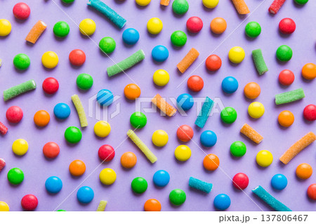 colorful candies as background top view. Seamless pattern with candy. Many sweet candies close-up colorful candies as background top view. Seamless pattern with candy. Many sweet candies close-up 137806467