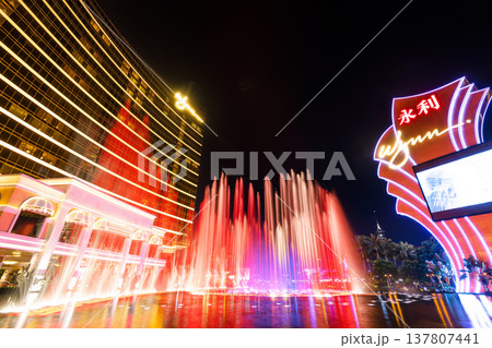 Beautiful night view of Wynn Performance Lake displays water, music, and light show, is a hotel casino resort in Macau, China. 137807441