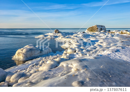 Icy Seascape, Coastal Fortification Ruins in Winter on Baltic Sea Shore, Liepaja Latvia Icy Seascape, Coastal Fortification Ruins in Winter on Baltic Sea Shore, Liepaja Latvia 137807611