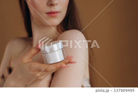 Close up view of woman that is with cream for skin 137809495
