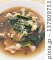Thai noodle soup Asian cuisine chicken noodle rice noodle hot soup savory broth green vegetable comfort food closeup dish homemade meal comforting Thai noodle soup with chicken noodle savory broth 137809753