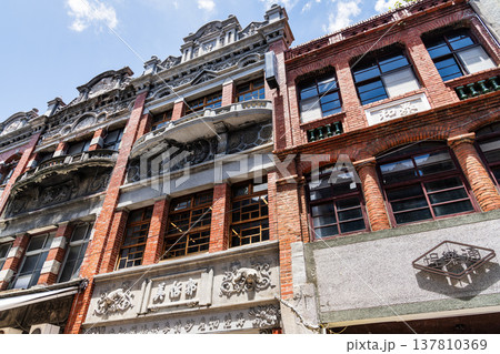 Low-angle view of old buildings in Dihua Street of Wanhua, Taipei City, Taiwan. Low-angle view of old buildings in Dihua Street of Wanhua, Taipei City, Taiwan. 137810369