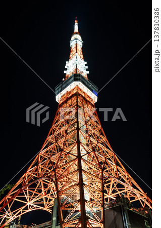 Night view of the Tokyo Tower in Minato, Tokyo, Japan. It is a lattice tower inspired by the Eiffel Tower. In Japan, the second-tallest tower is after Tokyo Skytree. Night view of the Tokyo Tower in Minato, Tokyo, Japan. It is a lattice tower inspired by the Eiffel Tower. In Japan, the second-tallest tower is after Tokyo Skytree. 137810386