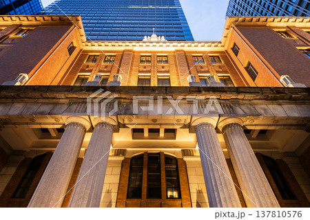 Low-angle view of the Mitsubishi UFJ Trust and Banking Museum, situated in the Marunouchi business and financial district, Chiyoda, Tokyo, Japan. Low-angle view of the Mitsubishi UFJ Trust and Banking Museum, situated in the Marunouchi business and financial district, Chiyoda, Tokyo, Japan. 137810576