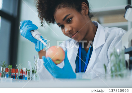 Chemical Laboratory of the Food supply . Food in laboratory, dna modify .GMO Genetically modified food in lab . Chemical Laboratory of the Food supply . Food in laboratory, dna modify .GMO Genetically modified food in lab . 137810996