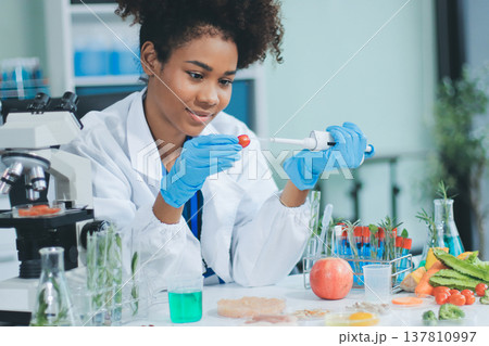 Chemical Laboratory of the Food supply . Food in laboratory, dna modify .GMO Genetically modified food in lab . 137810997