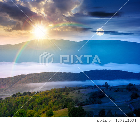 mountainous rural area during summer solstice. day meet night. sun and moon over remote mountain landscape with forested rolling hills. wonderful foggy place of alpine countryside wallpaper mountainous rural area during summer solstice. day meet night. sun and moon over remote mountain landscape with forested rolling hills. wonderful foggy place of alpine countryside wallpaper 137812631