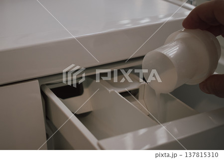 adding liquid fabric conditioner to washing machine for soft scented laundry results adding liquid fabric conditioner to washing machine for soft scented laundry results 137815310