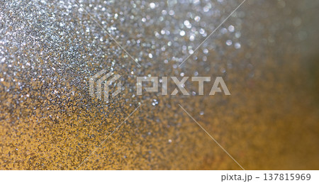Gold background with silver glitter and partial blur. Luxurius background concept Gold background with silver glitter and partial blur. Luxurius background concept 137815969