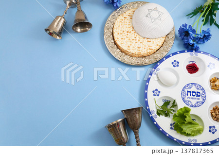 Passover seder plate with matzah and kippah for jewish holiday Passover seder plate with matzah and kippah for jewish holiday 137817365