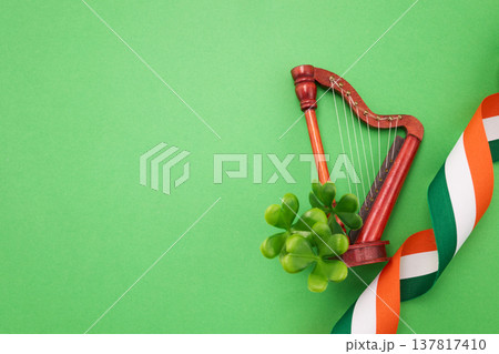 Irish harp, shamrock, and flag ribbon celebrating st. Patrick's day Irish harp, shamrock, and flag ribbon celebrating st. Patrick's day 137817410