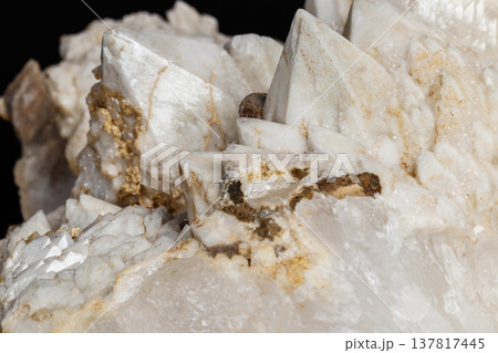 Macro mineral stone Snow quartz with calcite on a black background Macro mineral stone Snow quartz with calcite on a black background 137817445