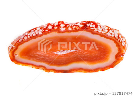Macro mineral orange agate in crystals on white background Macro mineral orange agate in crystals on white background 137817474