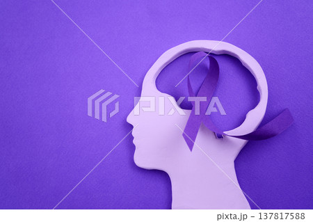 Human head silhouette with purple awareness ribbon 137817588