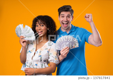 Rich Couple, Usd Currency. Lucky Man Woman With Money On Yellow, Success, Gain Rich Couple, Usd Currency. Lucky Man Woman With Money On Yellow, Success, Gain 137817841