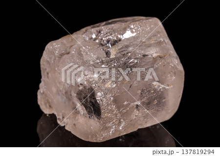 macro mineral stone Topaz on a black background macro mineral stone Topaz on a black background 137819294