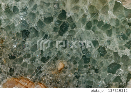 Macro stone Fluorite mineral on black background 137819312