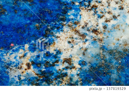 Macro of mineral stone Lazurite on a black background 137819329
