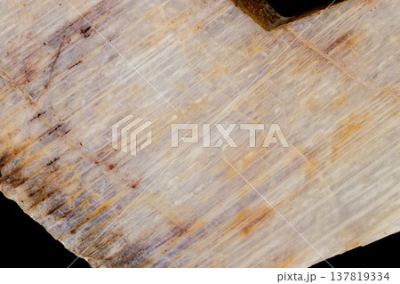 Macro of a stone mineral Moonstone on a black background 137819334