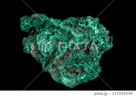 Macro of a mineral stone Malachite on a black background Macro of a mineral stone Malachite on a black background 137819344
