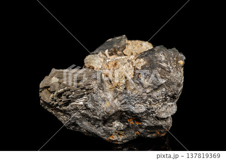 Macro stone Pyrite mineral with fluorite on a black background 137819369