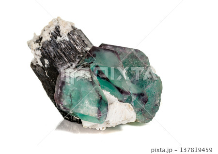 macro mineral fluorite stone on white background macro mineral fluorite stone on white background 137819459