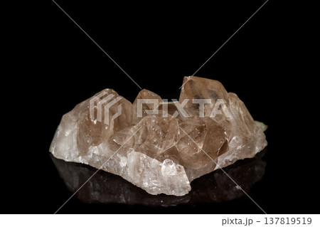 Macro mineral stone smoky quartz, rauchtopaz on a black background Macro mineral stone smoky quartz, rauchtopaz on a black background 137819519
