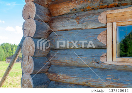 Corner of Wooden Log Cabin with Notched Joint, Close-Up 137820612