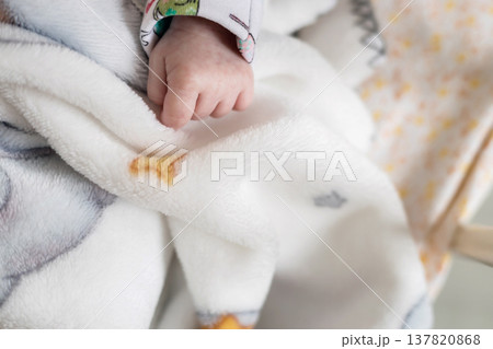 Tiny newborn hand resting on soft plush blanket Tiny newborn hand resting on soft plush blanket 137820868