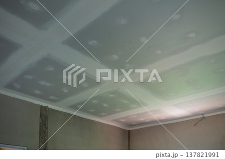 Ceiling renovation process residential home construction image indoor environment overhead view home improvement concepts Ceiling renovation process residential home construction image indoor environment overhead view home improvement concepts 137821991