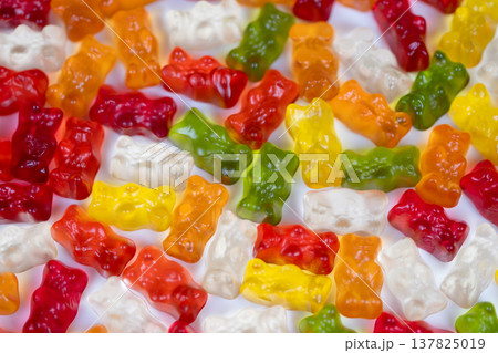 Colorful gummy backdrop. Vibrant gummy bear pattern ready. Bright multicolored gummy bears for designs. Repeatable and vivid gummy bears for creative branding templates Colorful gummy backdrop. Vibrant gummy bear pattern ready. Bright multicolored gummy bears for designs. Repeatable and vivid gummy bears for creative branding templates 137825019