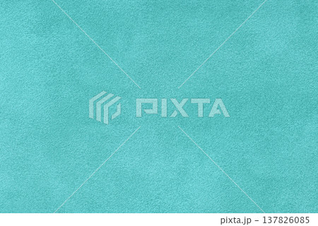 Light turquoise suede fabric background with matte nap velvet texture. Cyan tones and soft felt textile surface in macro Light turquoise suede fabric background with matte nap velvet texture. Cyan tones and soft felt textile surface in macro 137826085