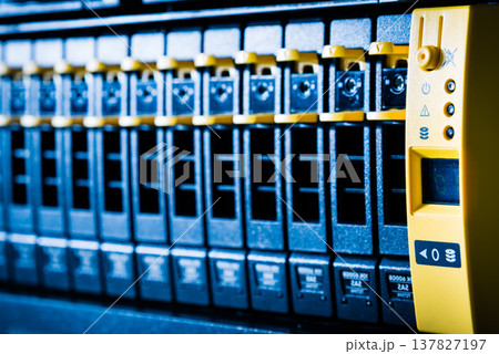 Array of data storage hard drives in internet data center 137827197