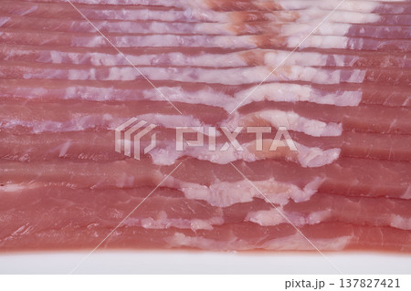 High detail bacon marbling forms abstract textures suitable for design. Wavy bacon with pink and white bands produces artistic food textures ideal for creative projects High detail bacon marbling forms abstract textures suitable for design. Wavy bacon with pink and white bands produces artistic food textures ideal for creative projects 137827421