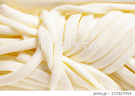 texture of cheese pigtail close-up texture of cheese pigtail close-up 137827454