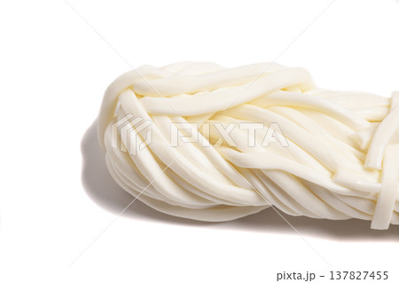 Cheese pigtail isolated on white background. Cheese pigtail isolated on white background. 137827455