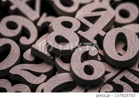 Pile of old wooden numbers in vintage style. Mathematics, education and learning concept. 137828787