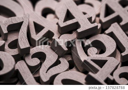 Pile of old wooden numbers in vintage style. Mathematics, education and learning concept. 137828788
