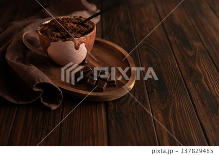 Chocolate mug cake on dark wooden table.Easy homemade dessert. Mugcake from microwave 137829485