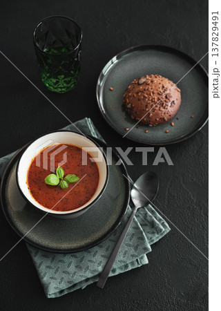 Bowl of homemade red bean soup on dark wooden table. Top view 137829491