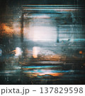 Abstract grunge background with optical lens flare glare scratches dust and film texture featuring blue orange and white light streaks creating moody vintage effect 137829598