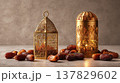 Luxurious Ramadan still life scene with golden lantern, ornate container, and scattered dates on stone table, warm lighting creates festive, peaceful atmosphere 137829602